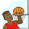 Basketball player slam dunks during the basketball game