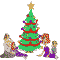 Family by the Christmas tree