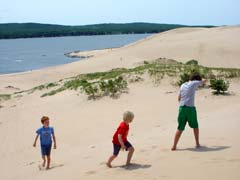 Visitors reaching the beach at Silver Lake after hiking across the dunes are treated with beautiful views!